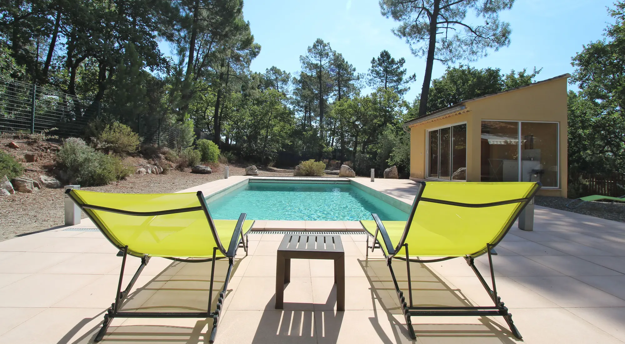 Villa with private pool surrounded by pine trees